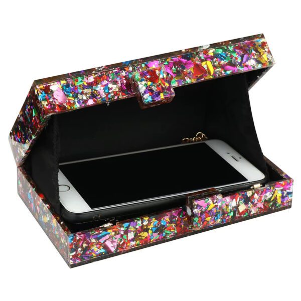 A colorful box with a cell phone inside of it.