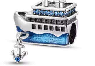 A boat with blue sails and a anchor charm.