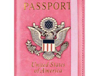 A pink passport cover with an eagle and the word " passport " on it.