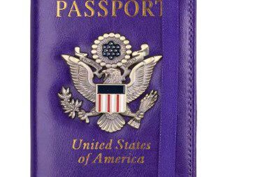 A purple passport cover with an eagle and the word " united states of america ".