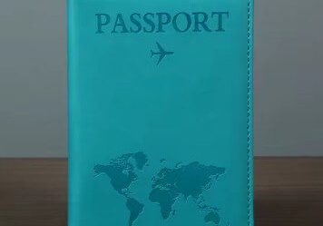 A passport cover with an airplane on it.