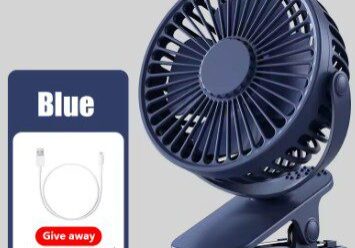 A blue fan is sitting on top of a table.