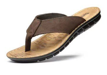 A brown flip flop is shown on the ground.