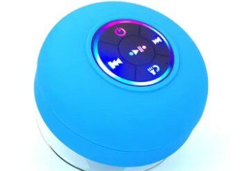 A blue and white ball with a button on it