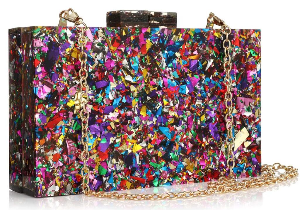 A colorful purse with many colors of confetti.
