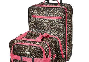 A pink and black luggage set with wheels.