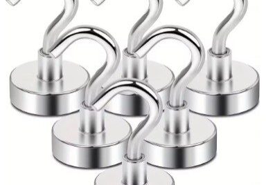 A set of six magnets that are hanging from hooks.