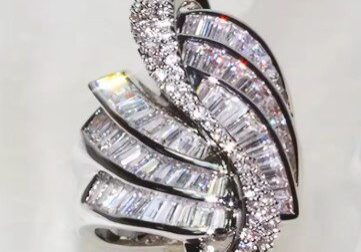 A ring with many different shapes and sizes of diamonds.