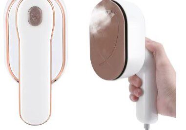 A person holding a hair dryer in their hand.